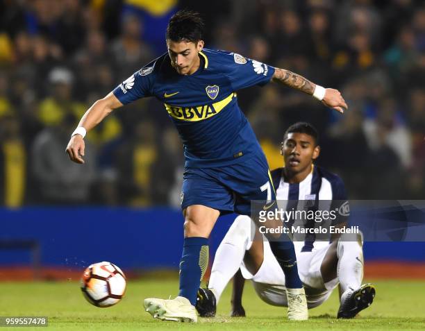 Cristian Pavon of Boca Juniors fights for the ball with Aldair Fuentes of Alianza Lima during a match between Boca Juniors and Alianza Lima at...