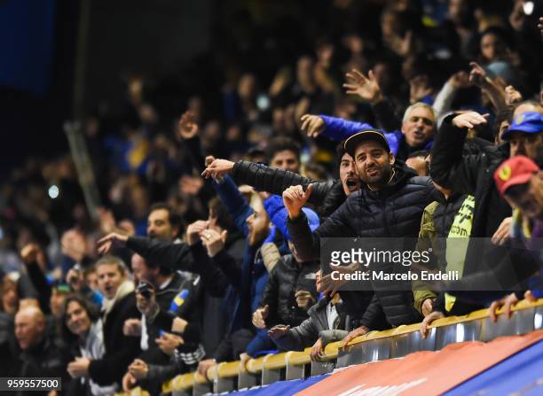 Fans of Boca Juniors cheer for their team during a match between Boca Juniors and Alianza Lima at Alberto J. Armando Stadium on May 16, 2018 in La...
