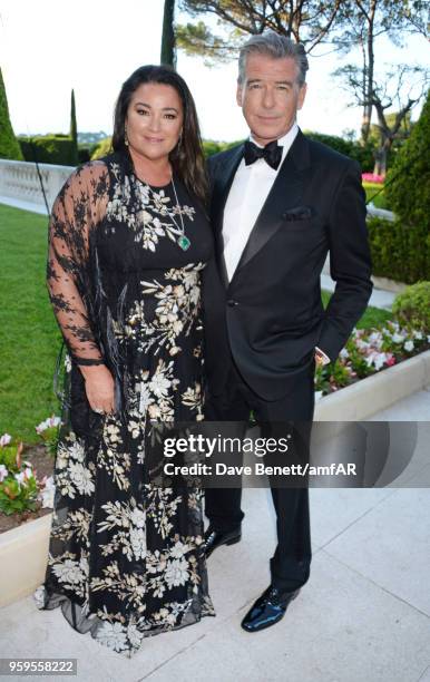 Keely Shaye Smith and Pierce Brosnan arrive at the amfAR Gala Cannes 2018 at Hotel du Cap-Eden-Roc on May 17, 2018 in Cap d'Antibes, France.