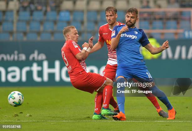 Alexander Nandzik of Regensburg and Lukas Hinterseer of Bochum battle for the ball during the second Bundesliga match between VfL Bochum 1848 and SSV...