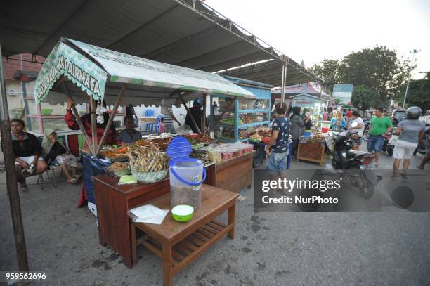 Ahead of the breaking fast, Muslims in Kupang come to the culinary market on the sidewalk to break the fast in Ramadan, Kupang, Indonesia, on May...