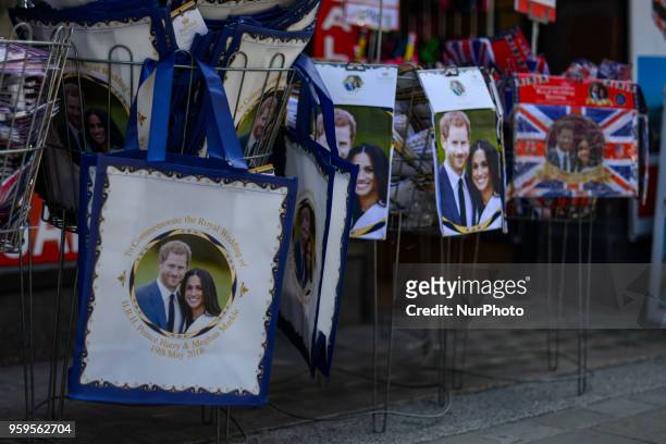 Souvenirs featuring Britain's Prince Harry and his fiance US actress Meghan Markle in a gift shop in Central London, on May 17, 2018. St George's...