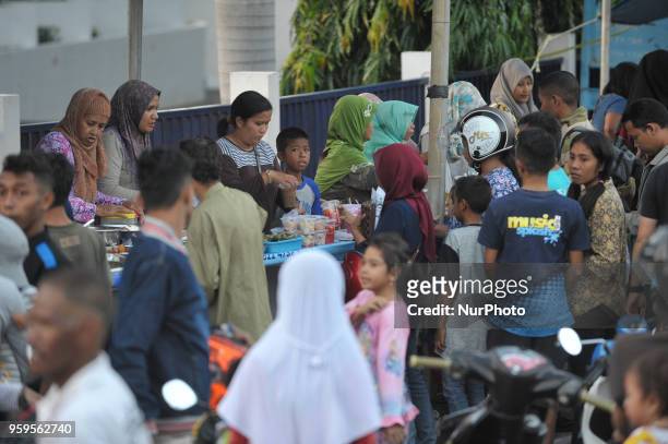 Ahead of the breaking fast, Muslims in Kupang come to the culinary market on the sidewalk to break the fast in Ramadan, Kupang, Indonesia, on May...
