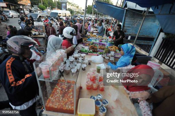 Ahead of the breaking fast, Muslims in Kupang come to the culinary market on the sidewalk to break the fast in Ramadan, Kupang, Indonesia, on May...