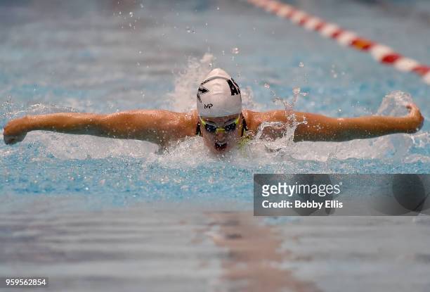 Allison Schmitt races in the Women's 100 meter butterfly preliminary race during the 2018 TYR Pro Swim Series at Indiana University Natatorium on May...