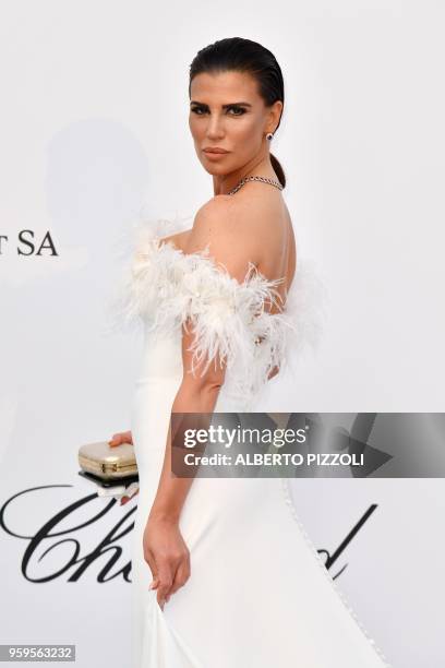 Paraguyan model Claudia Galanti arrives on May 17, 2018 for the amfAR 25th Annual Cinema Against AIDS gala at the Hotel du Cap-Eden-Roc in Cap...