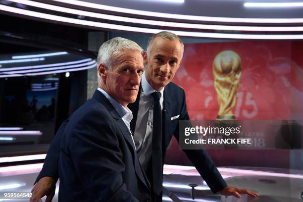 France's football team head-coach Didier Deschamps poses with host Gilles Bouleau as he prepares to announce his 23-man squad for the World Cup 2018...