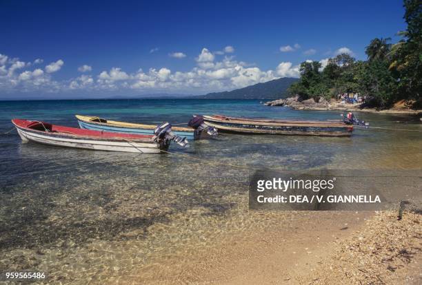Small boats on a beach near Port Antonio, Jamaica.