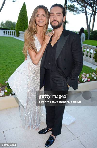 Heidi Klum and Tom Kaulitz arrive at the amfAR Gala Cannes 2018 at Hotel du Cap-Eden-Roc on May 17, 2018 in Cap d'Antibes, France.