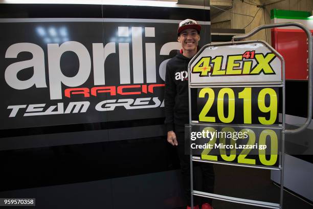 Aleix Espargaro of Spain and Aprilia Racing Team Gresini poses in box in order to celebrates the new contract for next two seasons during the MotoGp...