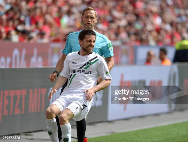 Julian Korb of Hannover gestures during the Bundesliga match between Bayer 04 Leverkusen and Hannover 96 at BayArena on May 12, 2018 in Leverkusen,...