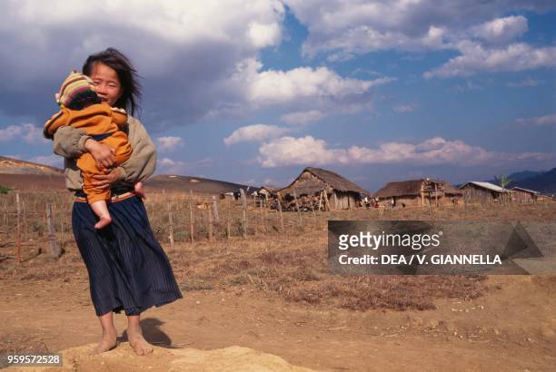 Two children of Hmong people in a village in the Plain of Jars, Laos.