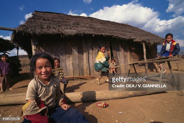 Children of Hmong people in a village in the Plain of Jars, Laos.