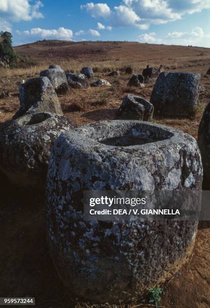 Jars in sandstone in the archaeological site of the Plain of Jars, plateau of Xiangkhoang, Laos.