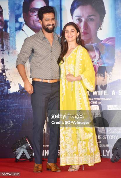 Indian film actor Vicky Kaushal with actress Alia Bhatt pose for a picture during the success party of film Raazi at hotel Taj Lands End, Bandra in...