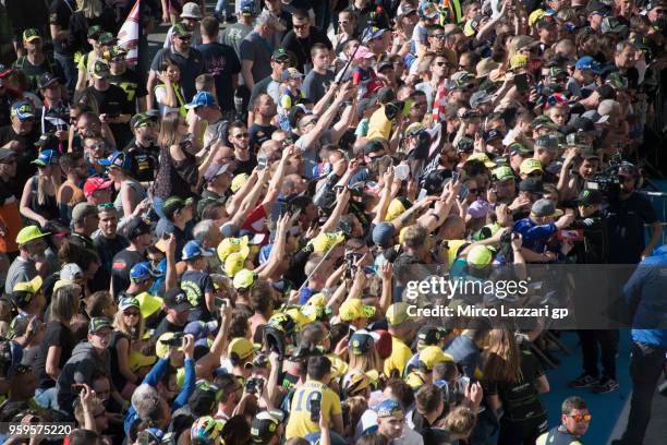 Johann Zarco of France and Monster Yamaha Tech 3 signs autographs for fans in pit during the MotoGp of France - Previews on May 17, 2018 in Le Mans,...