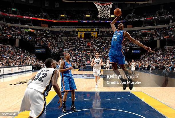 Kevin Durant of the Oklahoma City Thunder dunks the ball against the Memphis Grizzlies on January 22, 2010 at at FedExForum in Memphis, Tennessee....