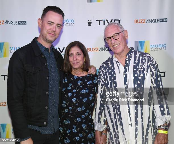 Actor Colin Hanks, Patti Solomon and Michael Solomon take photos before the Music Biz 2018 Awards Luncheon for the Music Business Association on May...