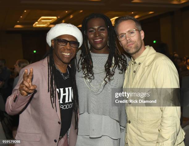 Producer Nile Rodgers, artist Shea Diamond and artist Justin Tranter take photos during the Music Biz 2018 Awards Luncheon for the Music Business...