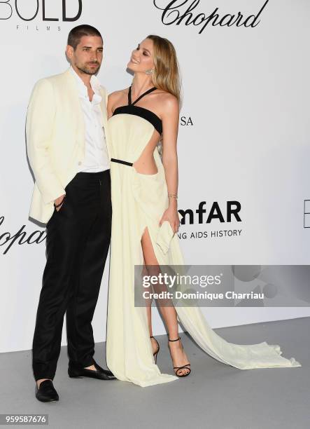 Carl Hirschmann and Fiammetta Cicogna arrive at the amfAR Gala Cannes 2018 at Hotel du Cap-Eden-Roc on May 17, 2018 in Cap d'Antibes, France.