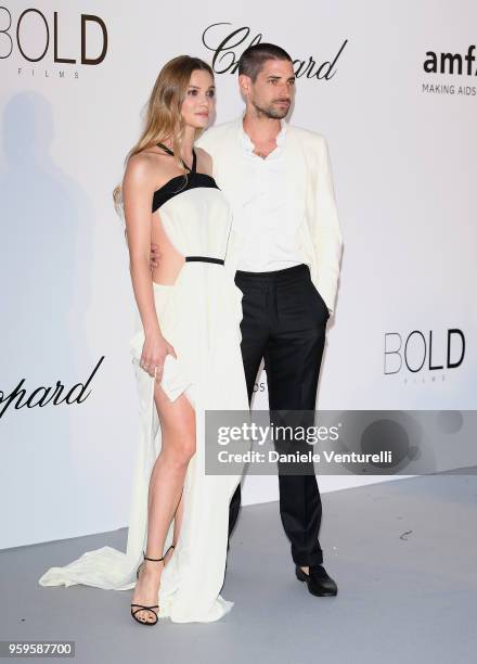 Carl Hirschmann and Fiammetta Cicogna arrive at the amfAR Gala Cannes 2018 at Hotel du Cap-Eden-Roc on May 17, 2018 in Cap d'Antibes, France.