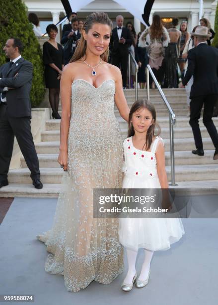 Victoria Bonya and her daughter Angelina Laetitia Smurfit arrive at the amfAR Gala Cannes 2018 at Hotel du Cap-Eden-Roc on May 17, 2018 in Cap...