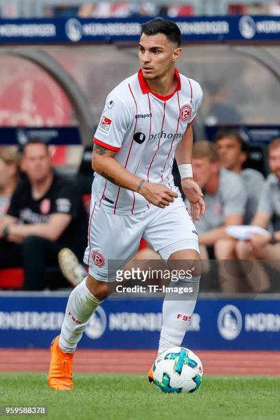 Kaan Ayhan of Duesseldorf controls the ball during the Second Bundesliga match between 1. FC Nuernberg and Fortuna Duesseldorf at Max-Morlock-Stadion...