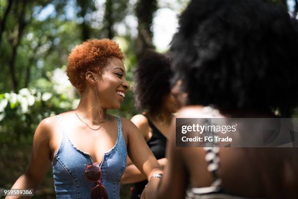 mixed racial group dancing - nigerian girls stock pictures, royalty-free photos & images