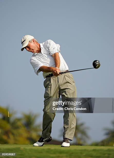 Ben Crenshaw tees off on during the first round of the Mitsubishi Electric Championship at Hualalai held at Hualalai Golf Club on January 22, 2010 in...