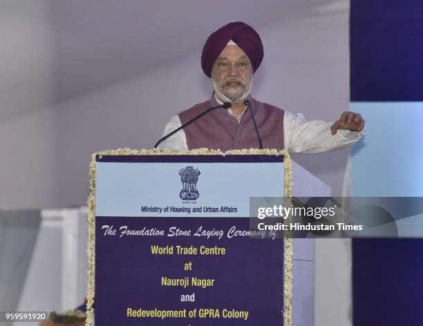 Union Minister of State of Housing and Urban Affairs Hardeep Singh Puri speaks during the foundation stone laying ceremony of World Trade Centre at...