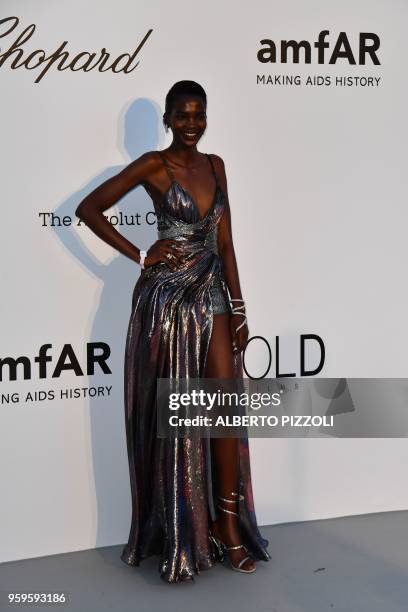 Ugandan model Aamito Lagum arrives on May 17, 2018 for the amfAR 25th Annual Cinema Against AIDS gala at the Hotel du Cap-Eden-Roc in Cap d'Antibes,...