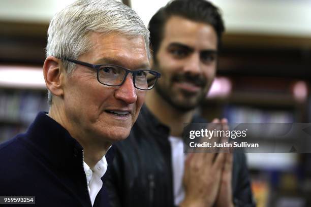 Apple CEO Tim Cook and actor, model, and activist for the deaf community Nyle DiMarco speak to students at the California School for the Deaf on May...