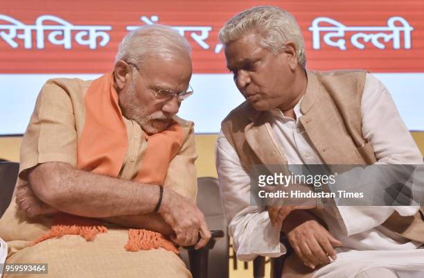 Prime Minister Narendra Modi listens to BJP National General Secretary Ramlal, during the concluding session of the National Executive Committee...
