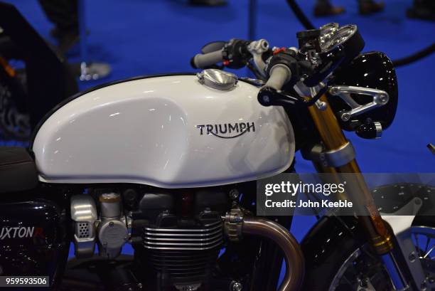 Triumph Thruxton 1200R motorcycle is displayed as part of the "Built in Britain" during the London Motor Show at ExCel on May 17, 2018 in London,...