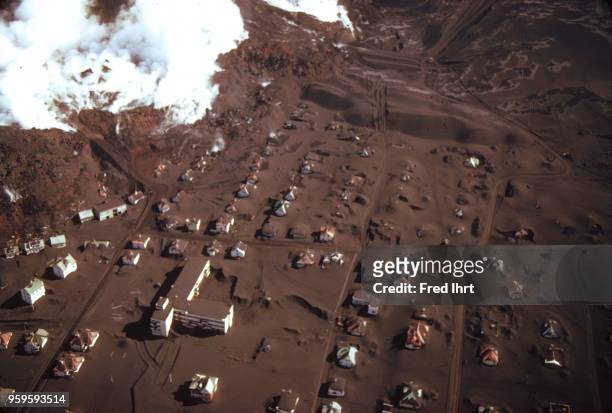 Volcano eruption on Heimaey Island in Iceland on 23 January 1973. Aerial view of the city of Vestmannaeyjar buried in lava and ashes.
