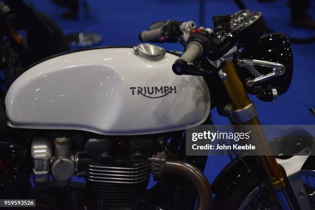 Triumph Thruxton 1200R motorcycle is displayed as part of the "Built in Britain" during the London Motor Show at ExCel on May 17, 2018 in London,...