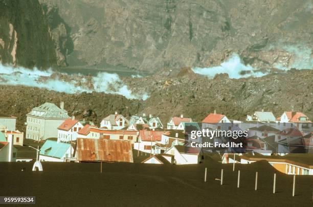 Volcano eruption on Heimaey Island in Iceland on 23 January 1973. The city of Vestmannaeyjar buried in lava and ashes.