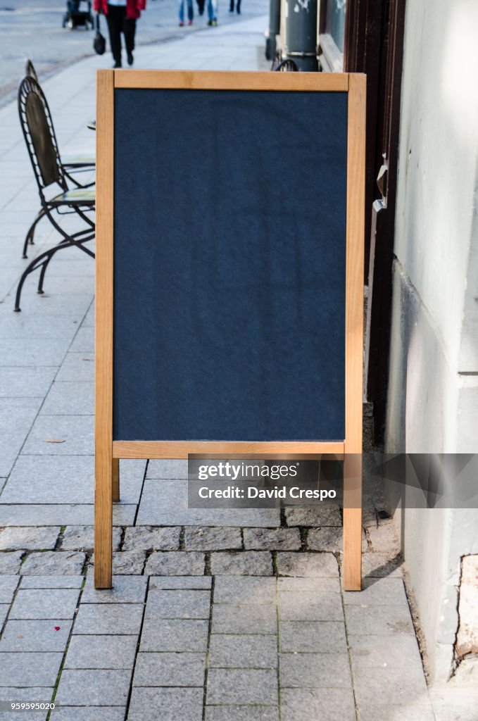 Blank sign outside a cafe (vertical)