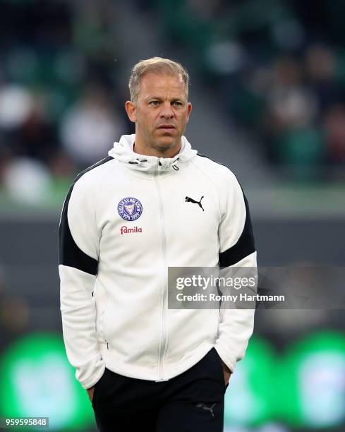 Head coach Markus Anfang of Holstein Kiel enters the pitch prior to the Bundesliga Playoff Leg 1 match between VfL Wolfsburg and Holstein Kiel at...