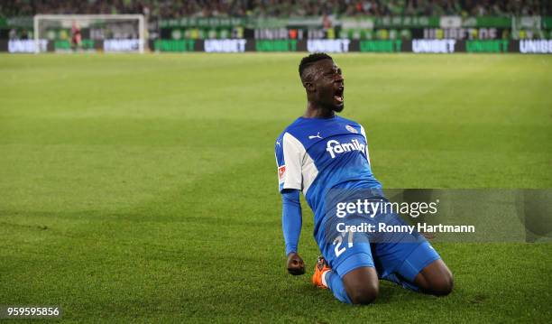 Kingsley Schindler of Holstein Kiel celebrates after scoring his team's first goal during the Bundesliga Playoff Leg 1 match between VfL Wolfsburg...