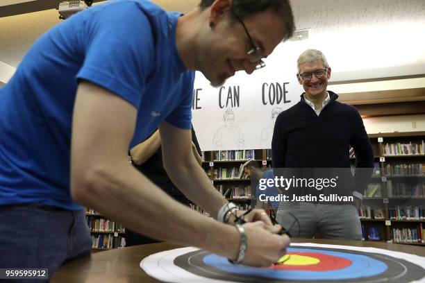 Apple CEO Tim Cook prepares to watch a demonstration with a drone at the California School for the Deaf on May 17, 2018 in Fremont, California. Cook...