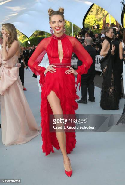 Alina Baikova arrives at the amfAR Gala Cannes 2018 at Hotel du Cap-Eden-Roc on May 17, 2018 in Cap d'Antibes, France.