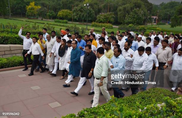 Ajay Maken, President of DPCC, along with other members of DPCC arrives to pay homage to Mahatma Gandhi in protest against BJP over the issue of...