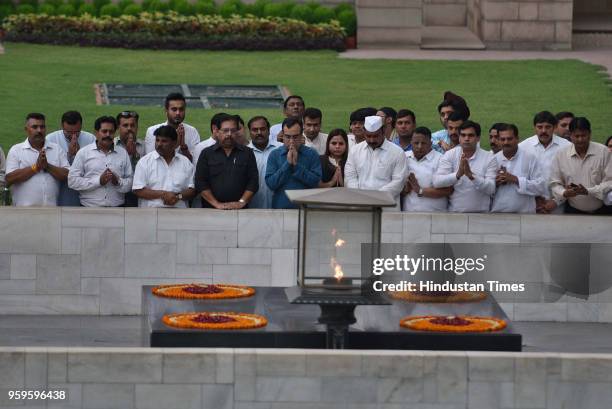 Ajay Maken, President of DPCC, along with other members of DPCC pays homage to Mahatma Gandhi in protest against BJP over the issue of forming...