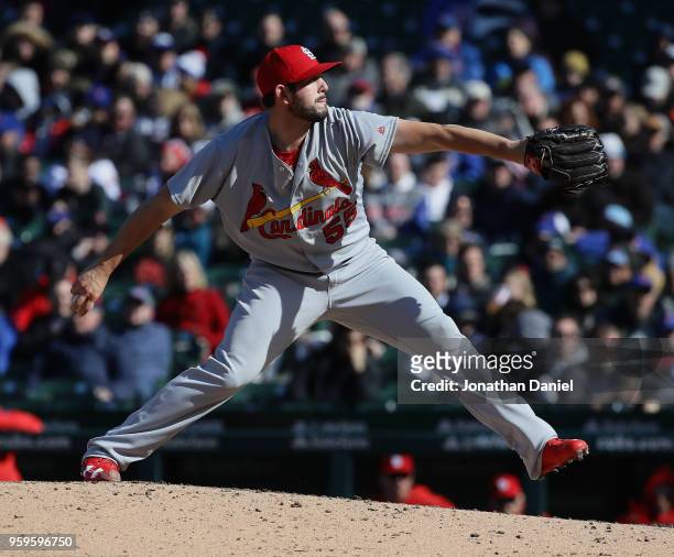 Dominic Leone of the St. Louis Cardinals pitches against the Chicago Cubs at Wrigley Field on April 19, 2018 in Chicago, Illinois. The Cubs defeated...