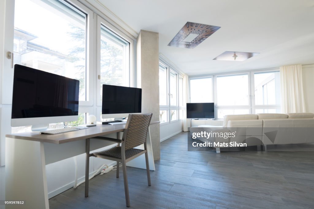 Modern Living Room with Home Office