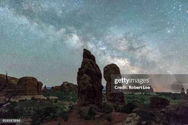 balanced rock milky way - lucid dreaming stock pictures, royalty-free photos & images
