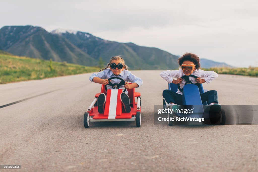 Young Business Girls Race Go Carts