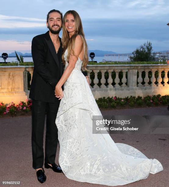 Tom Kaulitz and Heidi Klum attend the amfAR Gala Cannes 2018 dinner at Hotel du Cap-Eden-Roc on May 17, 2018 in Cap d'Antibes, France.