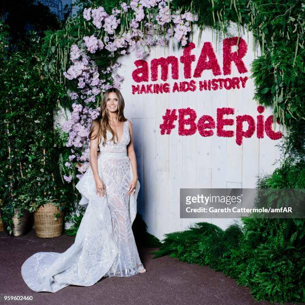 Image has been digitally retouched) Heidi Klum attends the amfAR Gala Cannes 2018 Studio at Hotel du Cap-Eden-Roc on May 17, 2018 in Cap d'Antibes,...